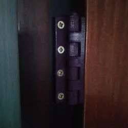 Wardrobe door hinge