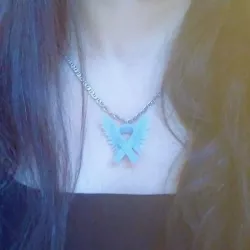 Necklace, artifact, pin,and key chain (hero ribbon) for stopping woman abuse