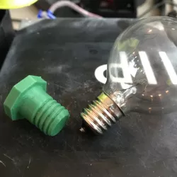 Screw-in lightbulb socket filler blank for E17/C9 base