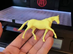 3D-printed toy horse figure (two halves)