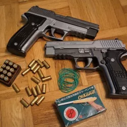 Blowback and shell ejecting rubber band gun (Sig Sauer P226)