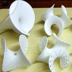 Enneper surfaces of order 2, 3, 4 perforated - minimum surfaces