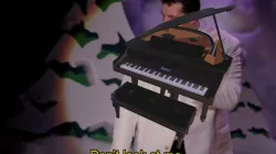 Grand Piano With Chair And Metronome