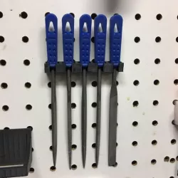 Small hand file set holder for pegboard