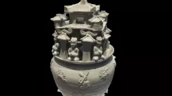 Celadon jar with architectural motif