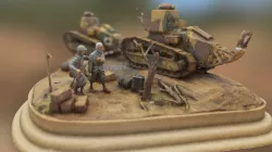 Wounded soldier passing by the tanks