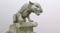 Weathered lion statue