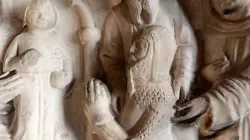 Relief of the Virgin Mary, a Saint and a Knight.
