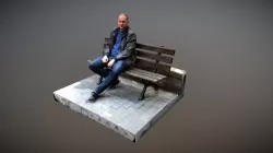 Man on bench ponders ....