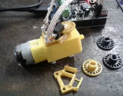 Encoder wheel and photointerrupter holder for yellow dc gear motor