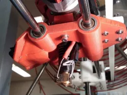 Makergear X-Carriage with built-in fan mount and duct for cooling nozzle.