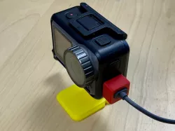 Dust cap with USB-C cable slot for DJI Osmo Action