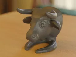 bull head statue on stand