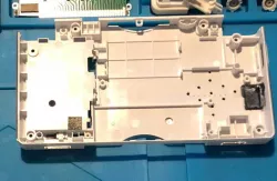 Nintendo DS Lite stylus hole cache