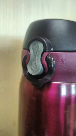 Satoshi thermos button