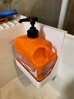 Utility sink hanging soap dispenser drip tray