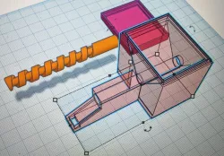 Fish feeder with auger and hopper