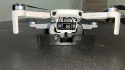 Drone landing pad (self lock and deploy)