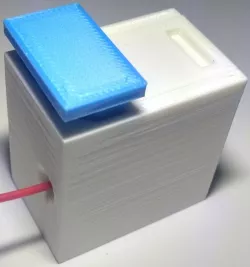 Filament cutter with compartment