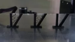 Expanding stringing test tower