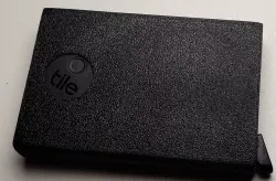 Secrid coin compartment with Tile Sticker