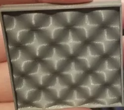 Shiny sinusoidal wave thing (print it vertically)