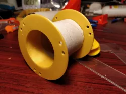 Wire spool from paper towel tube