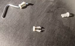 Locking pegboard hook adaptor