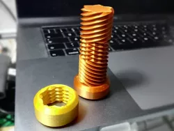 Reversing thread bolt for two-way nut