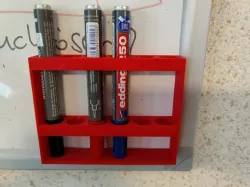 Magnetic bracket for whiteboard marker