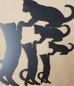 Cat sitting on door frame laser cut