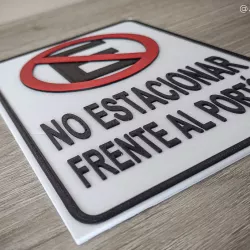 Aviso Prohibido Estacionar frende al Portón