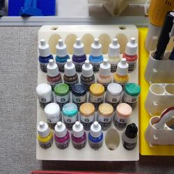 STL file Modular Paint Bottle Rack for Vallejo Wash, Vallejo Metal Color or  any Paint Bottle that is 38mm in diameter. paint bottle, modular, wall  mount, organization, model paint, art tool, paint