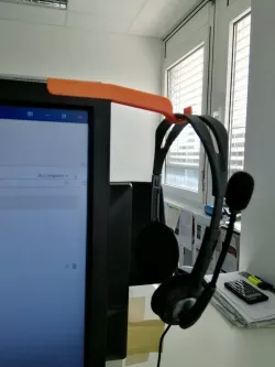 Extended headset hook for monitor