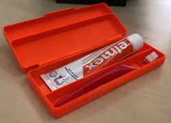 Tootbrush and toothpaste hinge in place holder [with fusion 360 source]