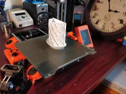 Half Helical rain/radiation shield for weather sensors