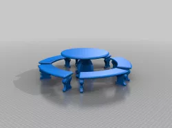 Mesa de cemento con banquitos