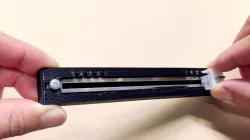 Slide potentiometer cover with click feeling and friction change
