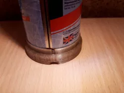 Stand for an aerosol can with shaving foam.
