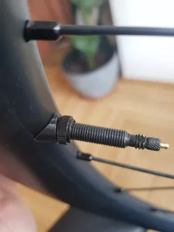 Asymmetrical Valve Washer