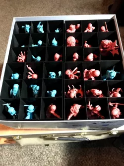 Marvel United mini trays for the stretch goal box