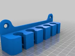 Pegboard gun cleaning rod holder
