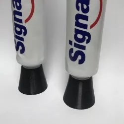TOOTHPASTE STAND CAP