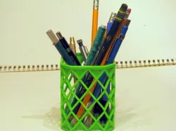 A pencil cup with triangles and diamonds