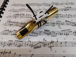 Adjustable String Ligature for Saxophone and Clarinet