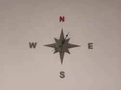 Wall clock (compass design)