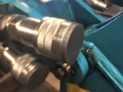 Hydraulic quick coupler dust cap