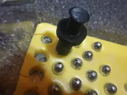 Parametric cookie cutter with pusher for greasing ogival balls black powder
