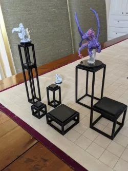 Stackable combat flying risers for RPG miniatures