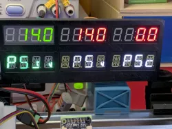 A mount for three each of Adafruit seven segment and Alphanumeric displays